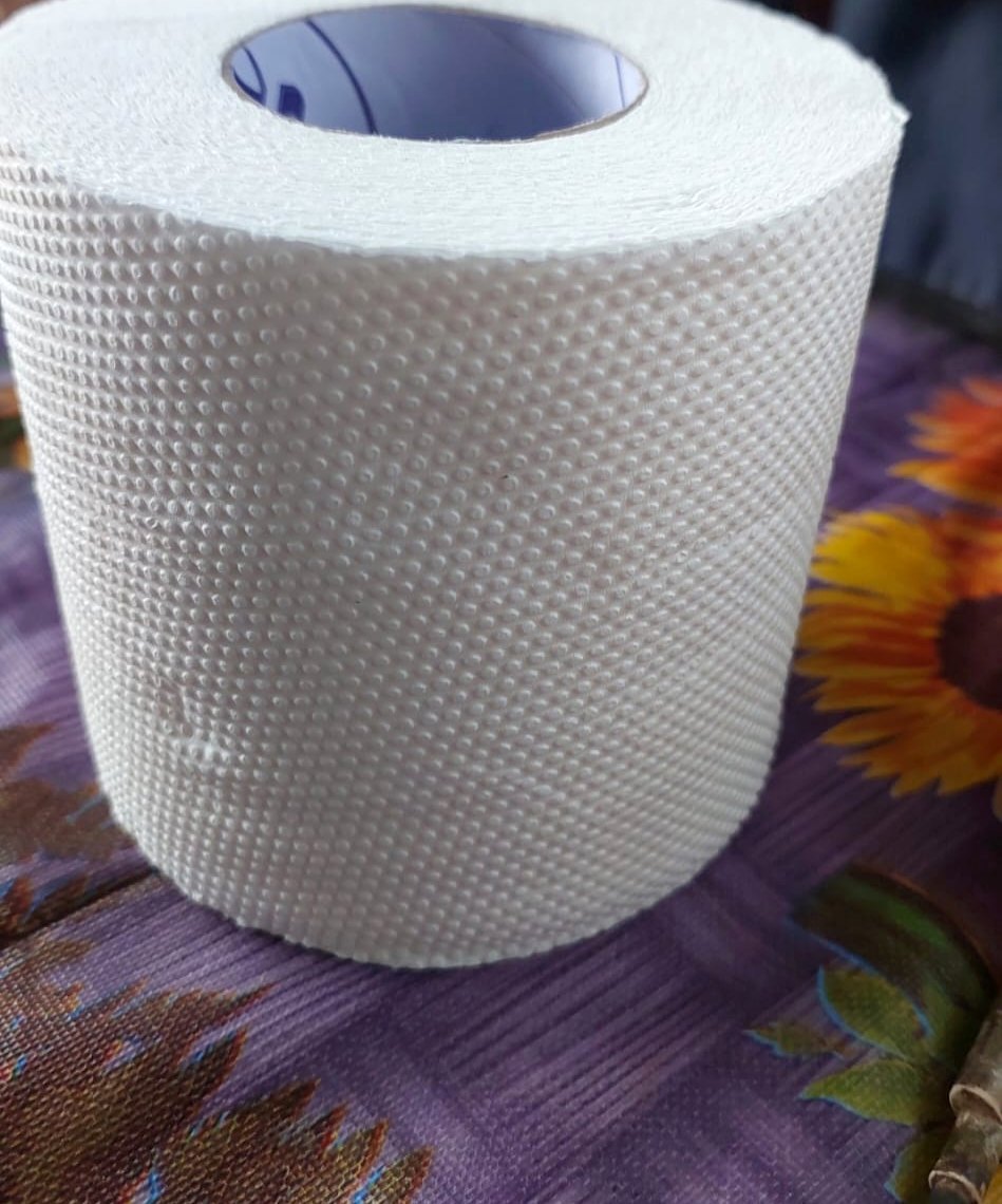 Unwrapped Serenity toilet roll showing the embossed surface